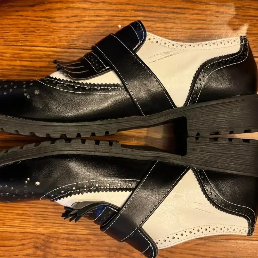 Black and cream leather mary Jane's